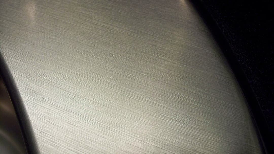 Brushed metal surface finish